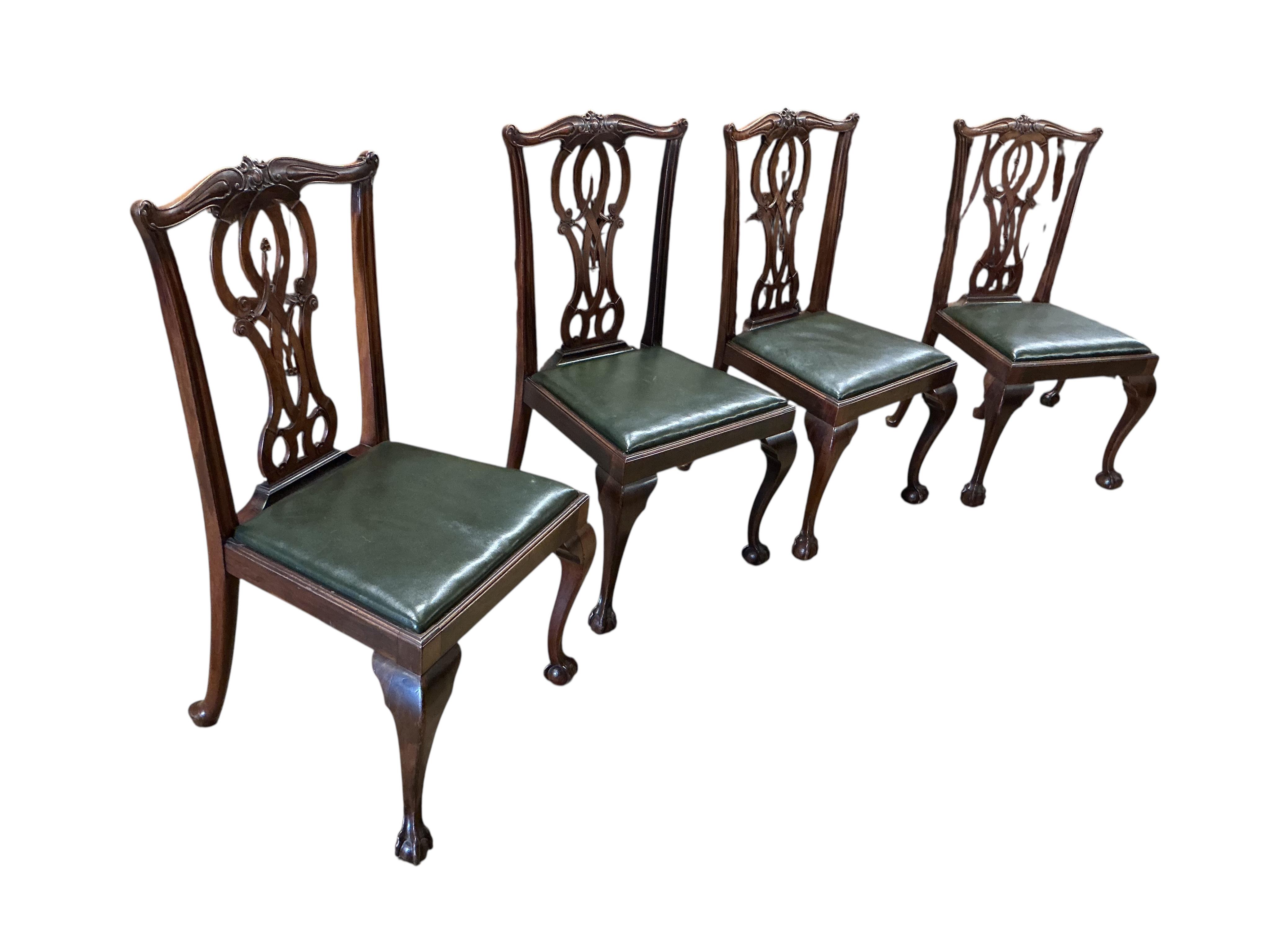 A set of nine Chippendale Revival mahogany dining chairs, two with arms